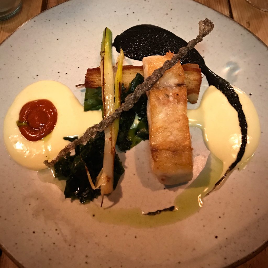 Stone bass, beure blanc and squid ink at Salut in Islington, London