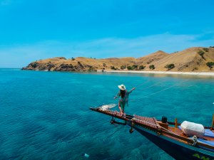 Admiring the beauty of Komodo from the Amalia's bow, Indonesia