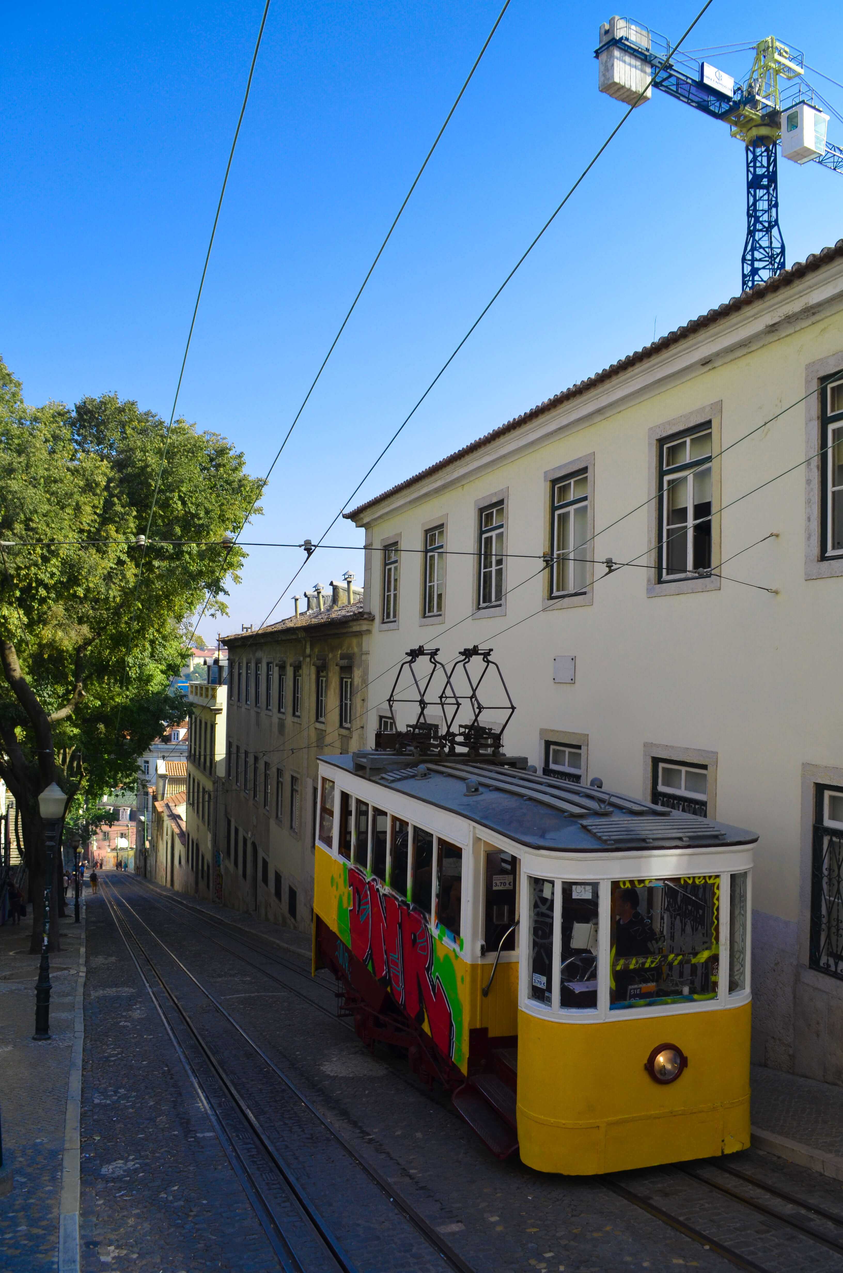 Yellow historic tram in Lisbon, Portugal