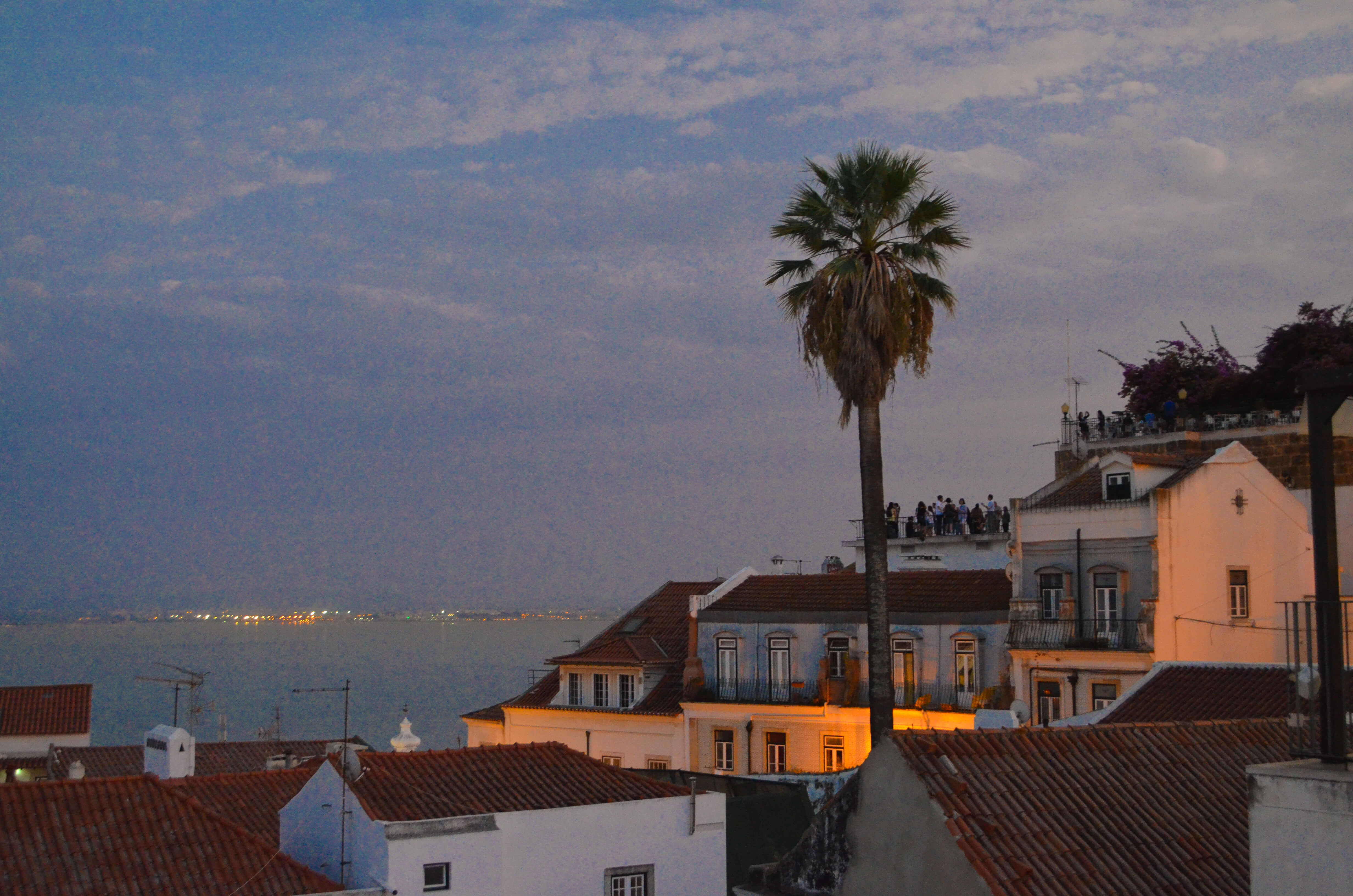 Portas del sol rooftop bar at sunset in Lisbon, Portugal