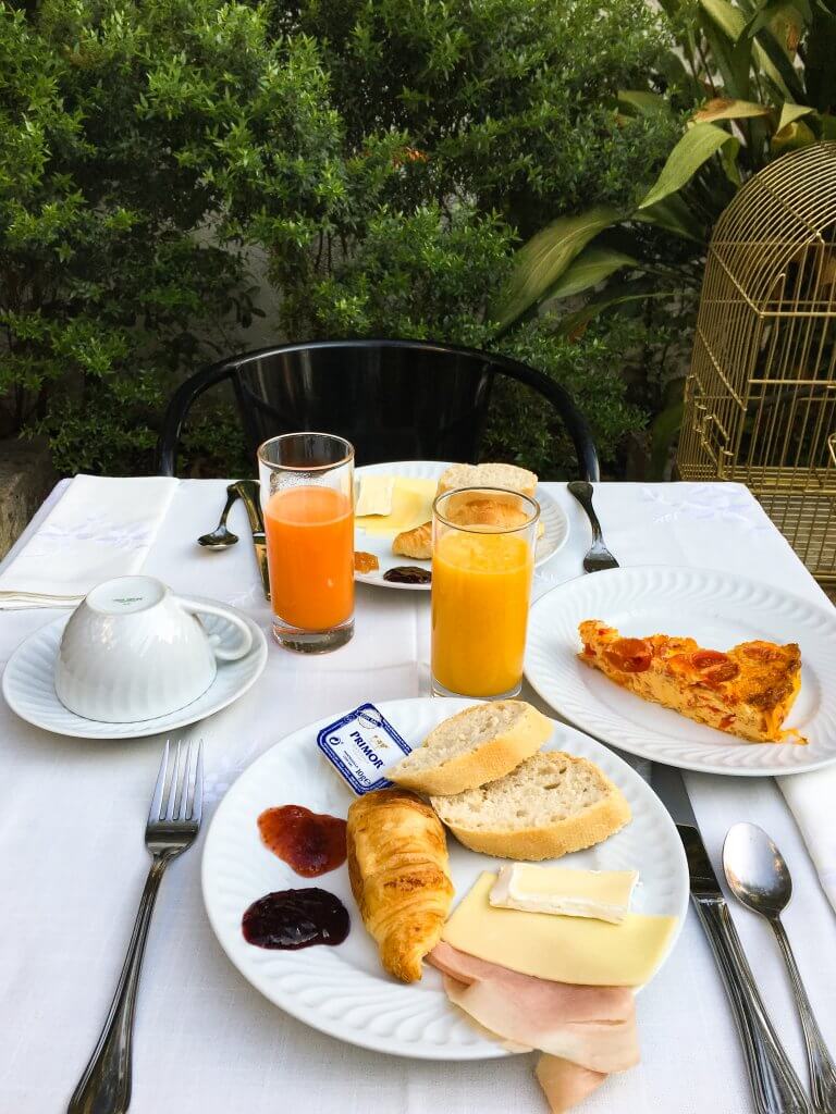 Breakfast in the garden at Casa do Barao, Lisbon, Portugal