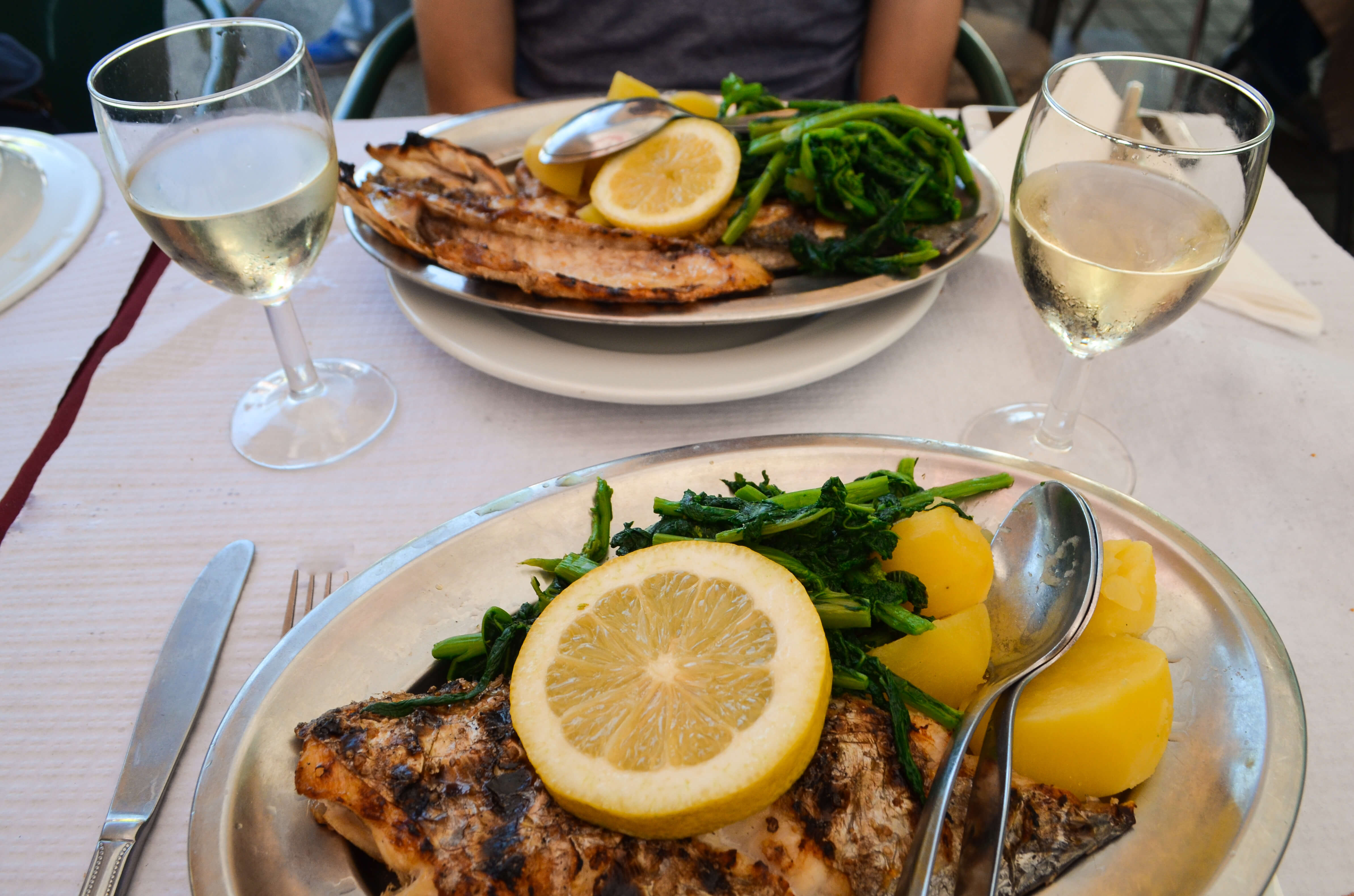 Freshly grilled fish at Ultimo Porto in Lisbon, Portugal