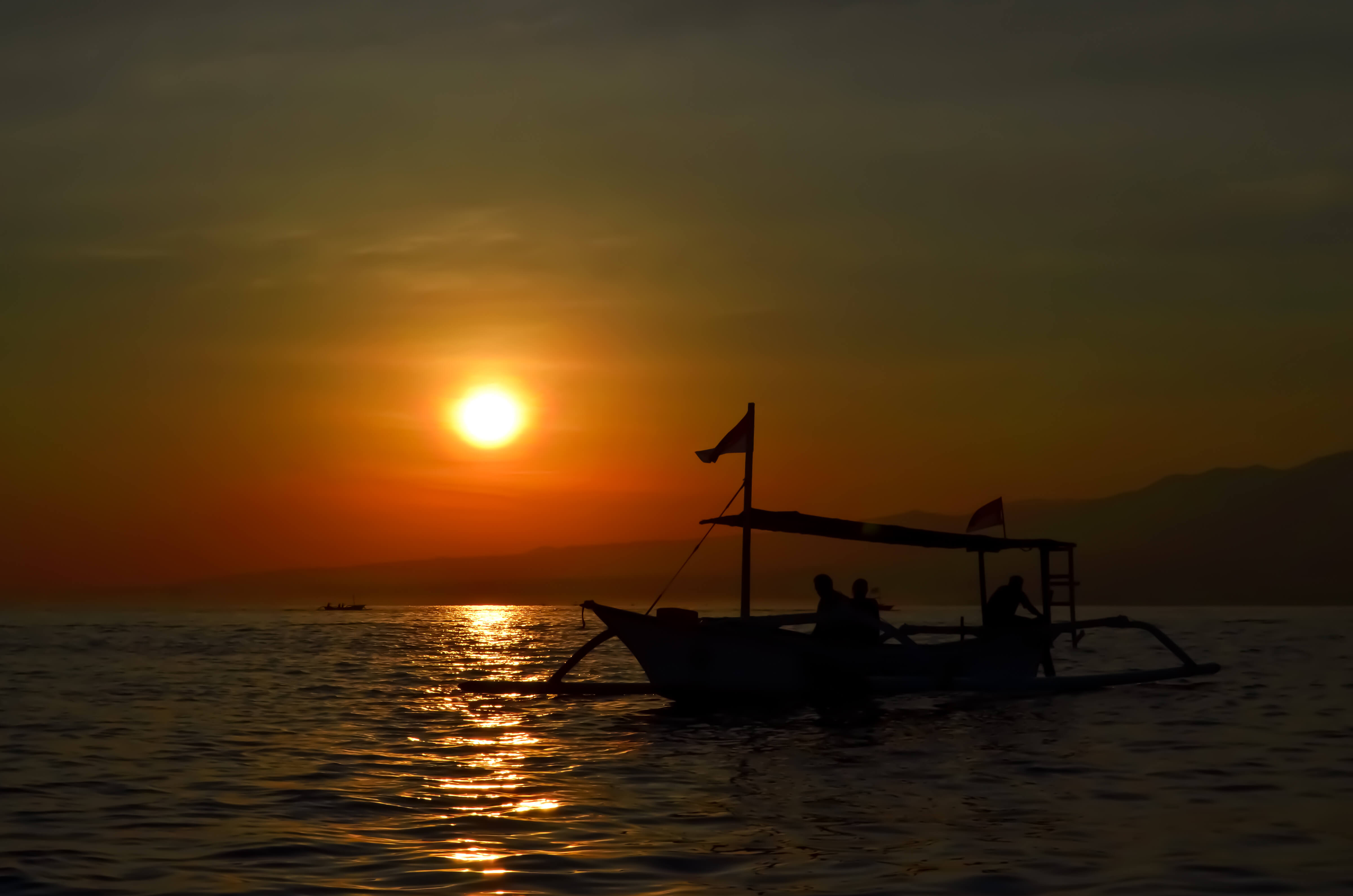 Bali Golden Tour - sunrise at Lovina beach in Northern Bali, Indonesia