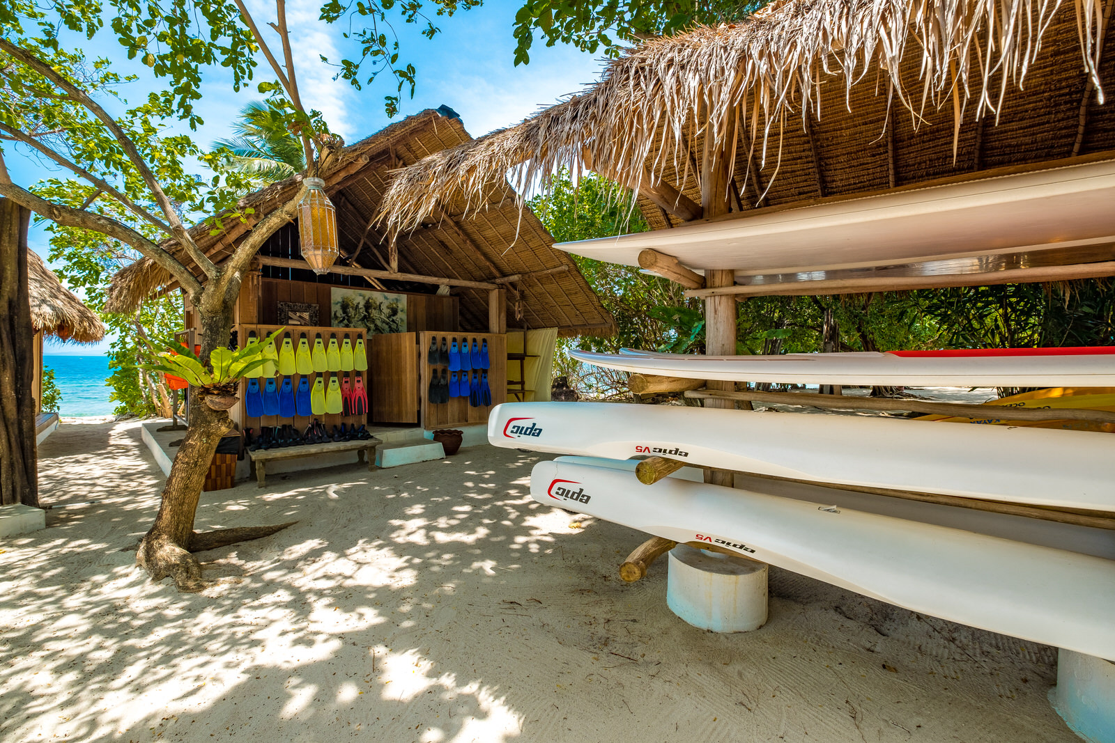 Pulau Joyo island, Indonesia - beach station with kayaks and snorkels