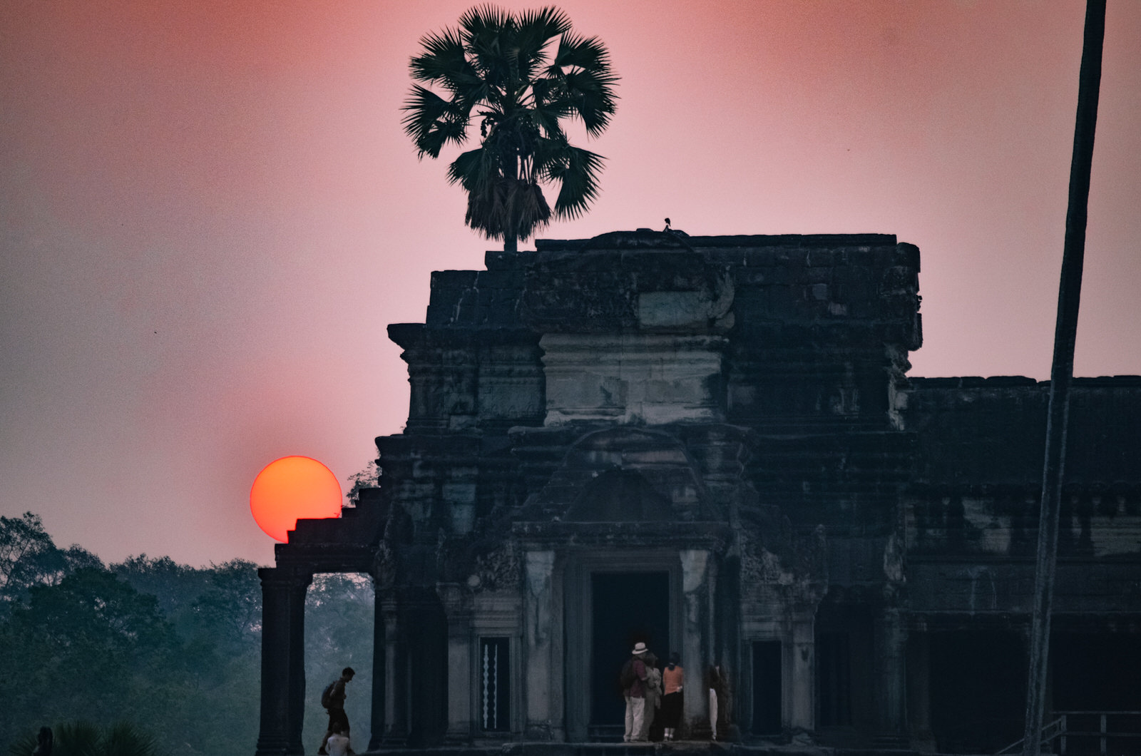 Visiting Angkor Wat in One Day - Watching sunrise at Angkor Wat temple, Siem Reap, Cambodia