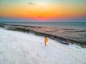 Azura Benguerra - Sunset walks on the beach, Bazaruto archipelago, Mozambique