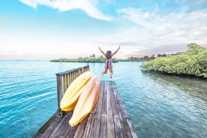 Jumping from the pier at Tranquilo Bay, Bocas del Toro, Panama