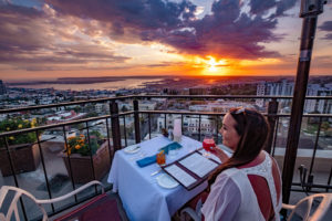 Views of the sunset and cocktails at Mister A's, San Diego, California