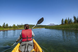 Kayaking on Hosmer Lake in the Cascades with Wanderlust Tours in Bend, Oregon